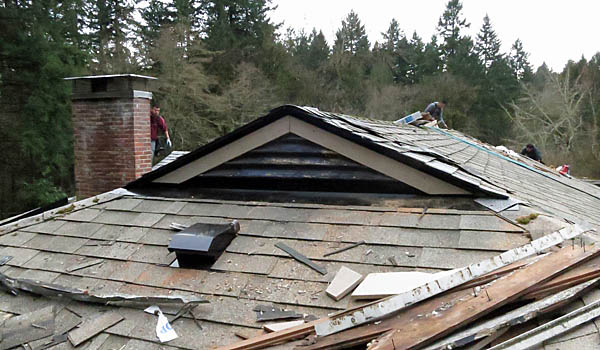 A view of a repaired dutch gable. For this one, the fascia boards were in such bad shape that they were completely replaced.
