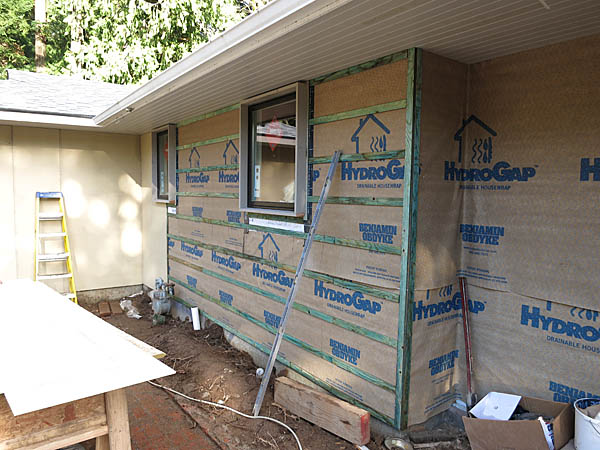 The horizontal strips hold the siding away from the building paper and allow the trim to be attached.