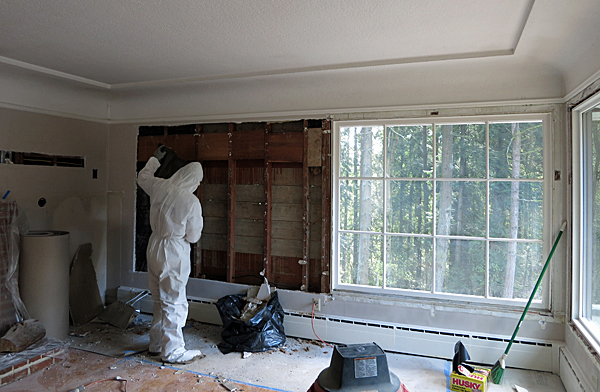 He stripped all of the plaster from the area of the new opening.